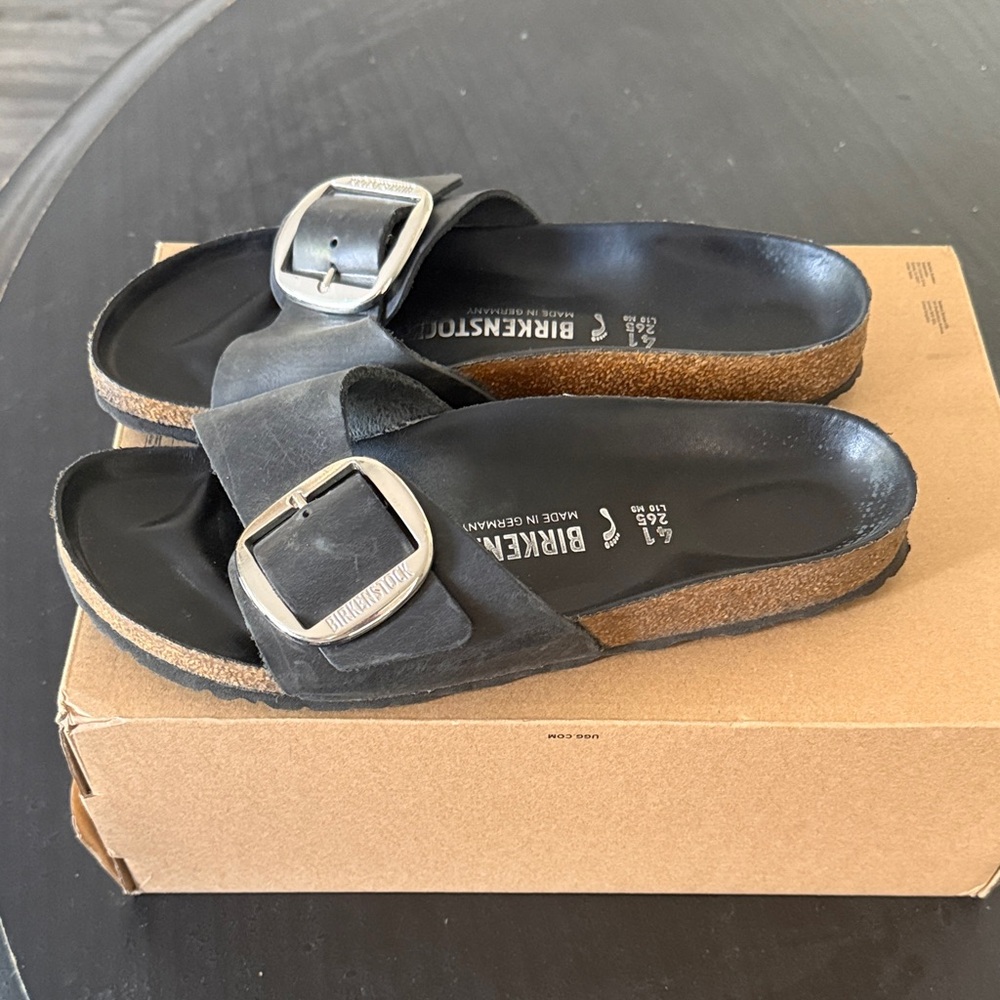 Birkenstock Black Single-Strap Slide with Large Silver Buckle